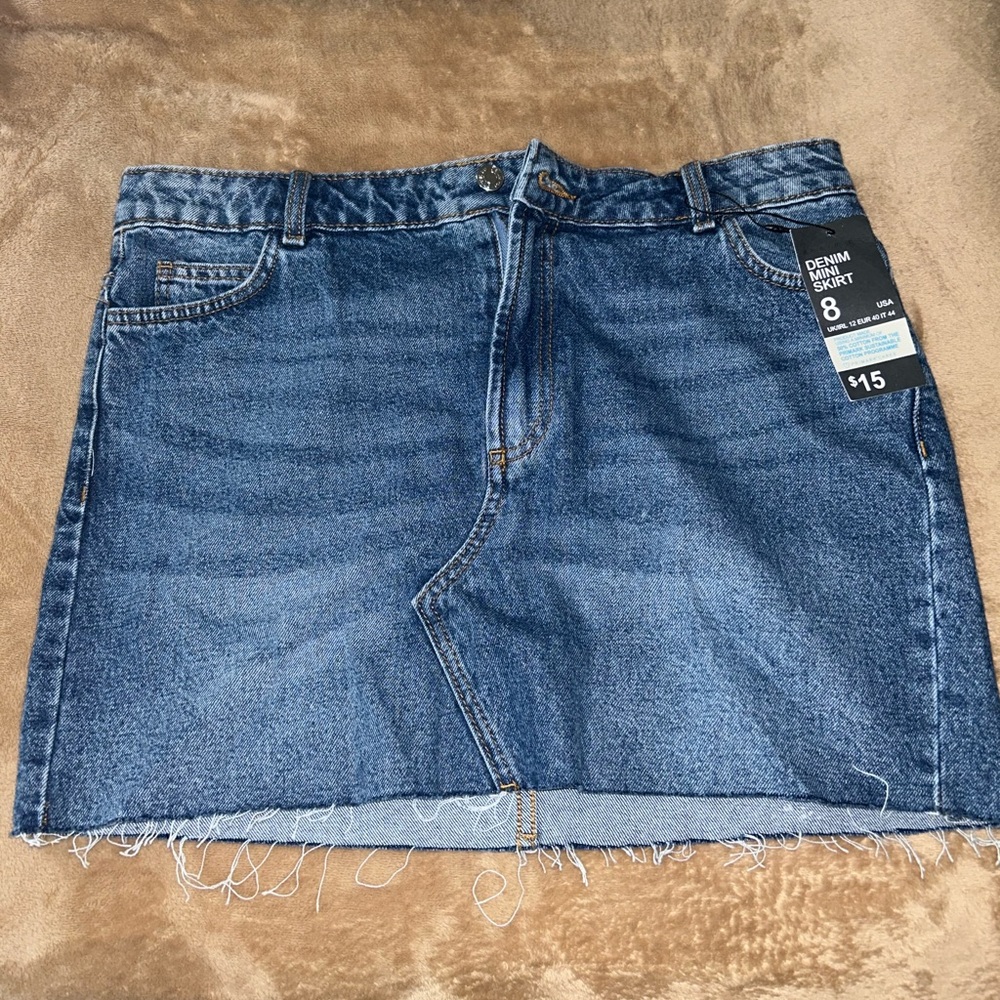 Mini blue denim skirt